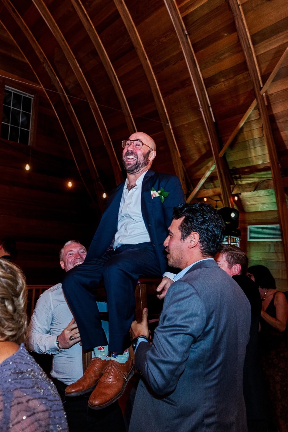 Danny lifted in the chair during the hora at his own wedding
